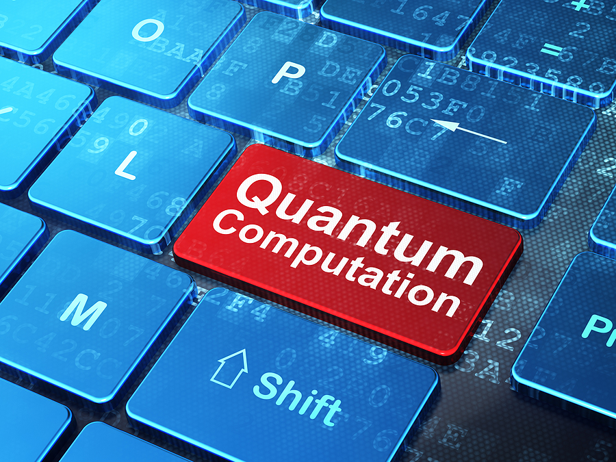 Science concept: Quantum Computation on computer keyboard backgr